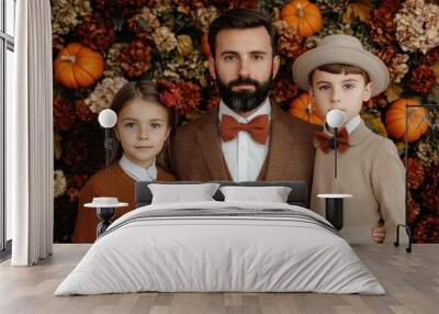 Family portrait with autumn decorations. Wall mural