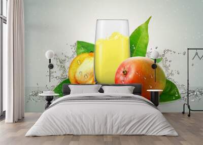 A glass of mango juice with mango fruit. Wall mural