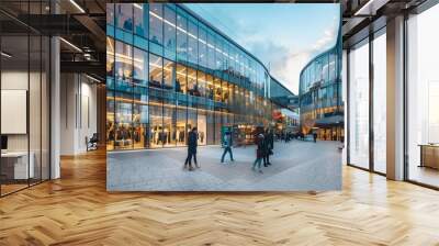 Modern shopping mall with transparent glass facade and trendy clothes store Wall mural