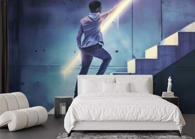 Side view of young man climbing illuminated arrow stairs to success on concrete wall background in interior. Financial growth, career development and forward concept  Wall mural