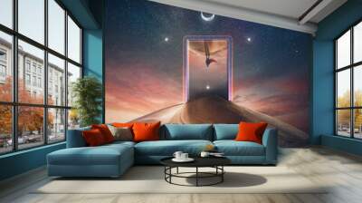 Parallel world portal open and a mysterious person with hero cape reflects in the neon gateway in the middle of a desert under the magical night sky with unique astral symbols Wall mural