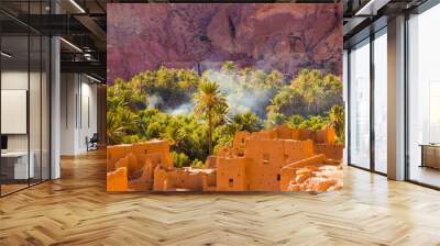 The ancient moroccan town near Tinghir with old kasbahs and high Atlas mountains in background, Tinghir, Morocco in Africa Wall mural