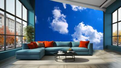 Blue sky with tiny clouds. Wall mural