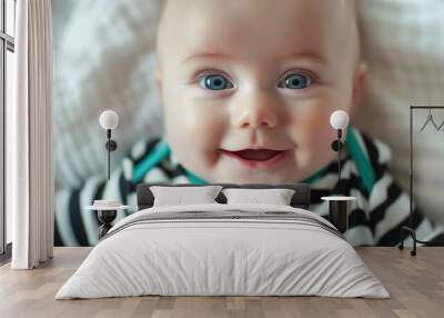 A close up photo of an adorable baby with blue eyes Wall mural