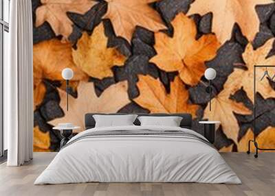 Colorful autumn leaves scattered on a dark background. Wall mural