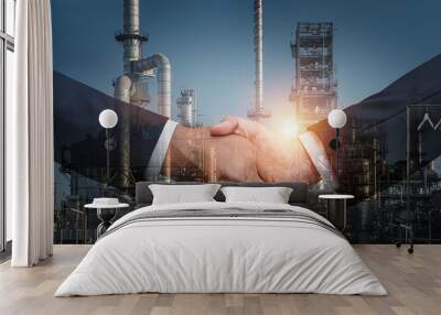 Double exposure of businessman handshake on future factory plant and energy industry  background,power and energy business concept. Wall mural