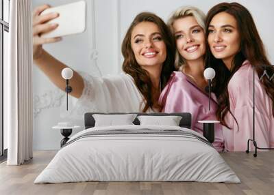 Beautiful Women Making Photos On Phone Wall mural