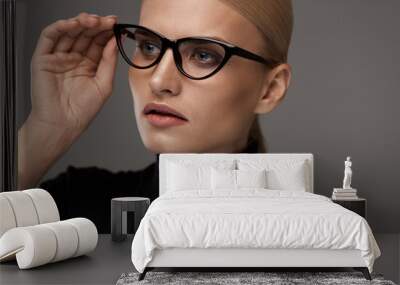 Female Eyewear Style. Beautiful Woman In Fashion Eyeglasses Wall mural