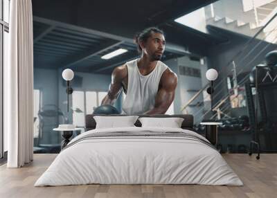 Man On Kettlebell Workout. Sexy Asian Sportsman With Strong, Healthy, Muscular Body Using Heavy Fitness Equipment. Training At Gym For Bodybuilding As Lifestyle. Wall mural