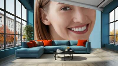 Smiling woman with beauty face and white teeth smile closeup Wall mural