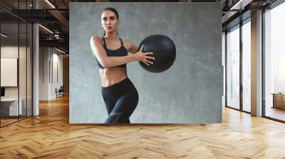 Sports Woman Training In Fashion Black Sportswear Wall mural