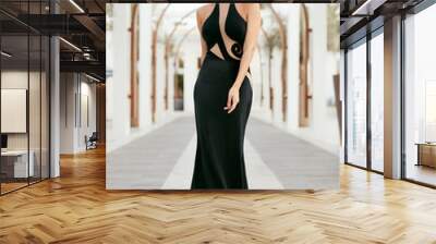 Women Style. Fashion Girl In Long Black Dress Posing Outdoors Wall mural