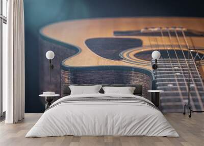 Close-up of a classical acoustic guitar in beautiful lighting. Wall mural