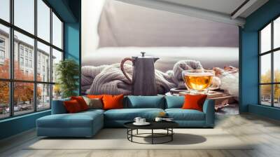 Cozy autumn still life with a cup of tea Wall mural