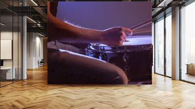 man playing the snare drum on a beautiful colored background Wall mural