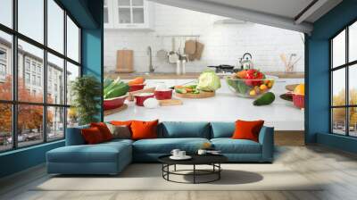 Modern stylish kitchen interior with vegetables and fruits on the table . Wall mural