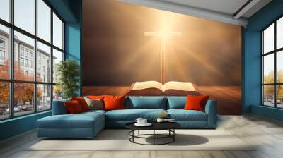 Open book Bible and cross on a dark background with light. Wall mural