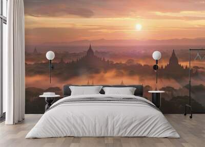 Ancient temples shrouded in mist at sunrise, a breathtaking scene of golden light and serenity. Wall mural