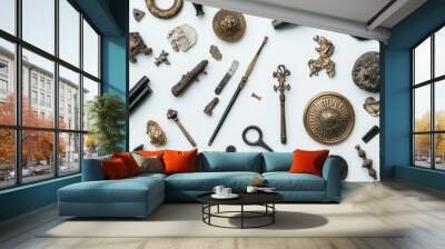 Assorted antique and vintage objects laid out on a white background. Wall mural