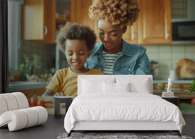 A black woman with short hair and her son, aged around eight years old, were making sandwiches in the kitchen of their home  Wall mural