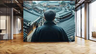 Man Observing a Cityscape of Traditional Korean Architecture Wall mural