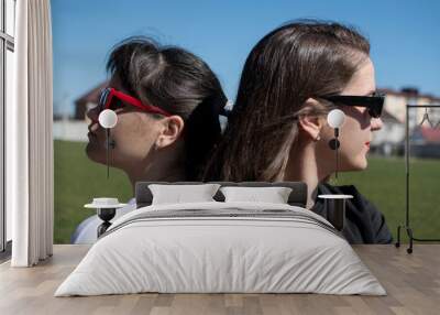 Close up portrait of a two young women in sunglasses	 Wall mural