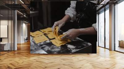 Pasta Making in Progress: Close-Up on Hands Crafting Dough Wall mural