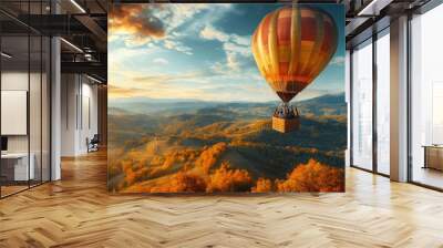 Hot Air Balloon Soaring Over Autumnal Mountains at Sunset Wall mural