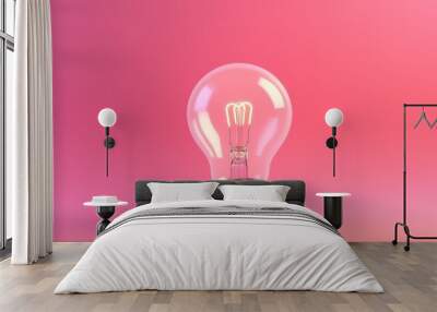 Illuminated Light Bulb Against Vibrant Pink Background Wall mural