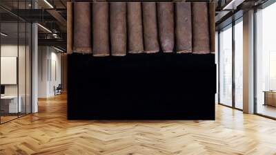 cigars on black background Wall mural