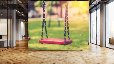 empty chain swing in children playgriund. vintage filter Wall mural