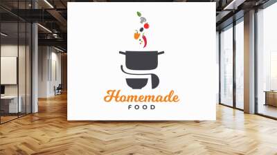 Homemade food logo. Pan with vegetables and plate Wall mural