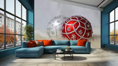 Red and silver Christmas ball on a sheep skin Wall mural