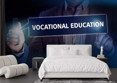 Businessman presses button vocational education on virtual scree Wall mural