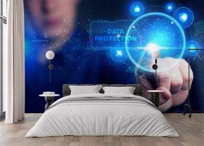 Cyber security data protection business technology privacy concept. Young businessman working  in the office, select the icon security on the virtual display. Data protection Wall mural