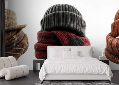 Assorted winter hats and scarves in various colors isolated on transparent background Wall mural