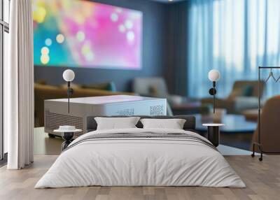 A modern projector sits on a table in a stylish, well-lit lounge area. Wall mural