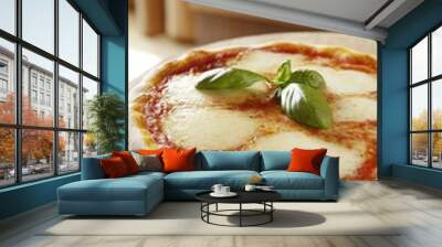 Delicious Italian pizza fresh from the oven, served on a wooden board in a cozy kitchen with warm, glowing fire Wall mural