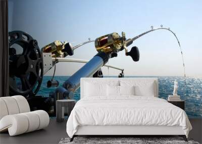 two fishing poles on back of boat Wall mural