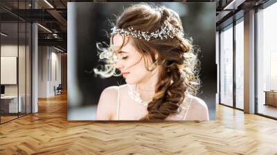 Closeup brunette bride with fashion wedding hairstyle and makeup Wall mural