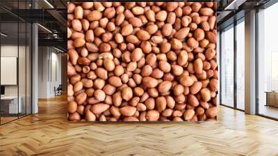 Roasted peanuts background in bamboo basket Wall mural