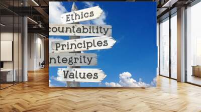 Ethics, accountability, principles, integrity, values - wooden signpost with five arrows Wall mural