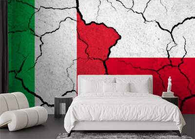 Flags of Italy and Poland on cracked surface - politics, relationship concept Wall mural