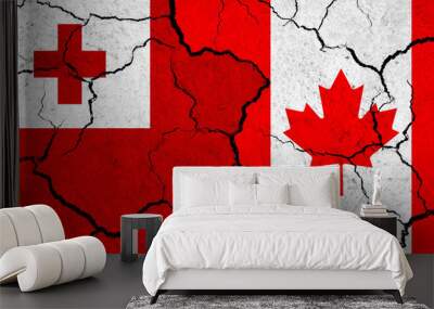 Flags of Tonga and Canada on cracked surface - politics, relationship concept Wall mural