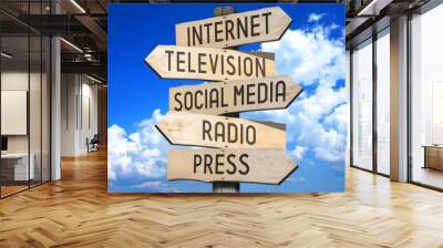 Wooden signpost - media concept (Internet, television, social media, radio, press). Wall mural