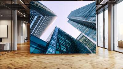 London Docklands skyscrapers. Low, wide angle view of converging glass and steel contemporary skyscrapers. Wall mural