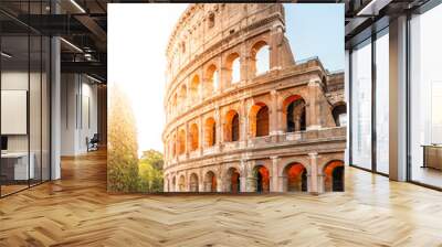 Colosseum, or Coliseum. Morning sunrise at huge Roman amphitheatre, Rome, Italy. Wall mural