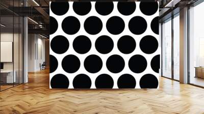 Seamless polka dot pattern in triangular arrangement. Black dots on white background. Vector illustration Wall mural