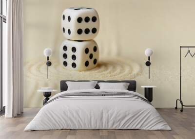 Two white dice with black dots on sand Wall mural