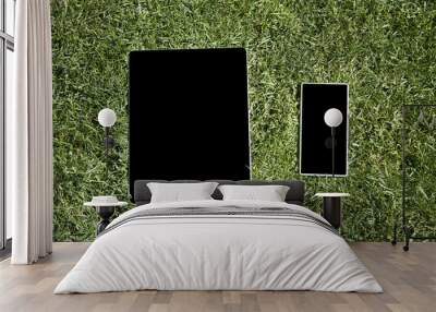 blank tablet and phone on grass Wall mural